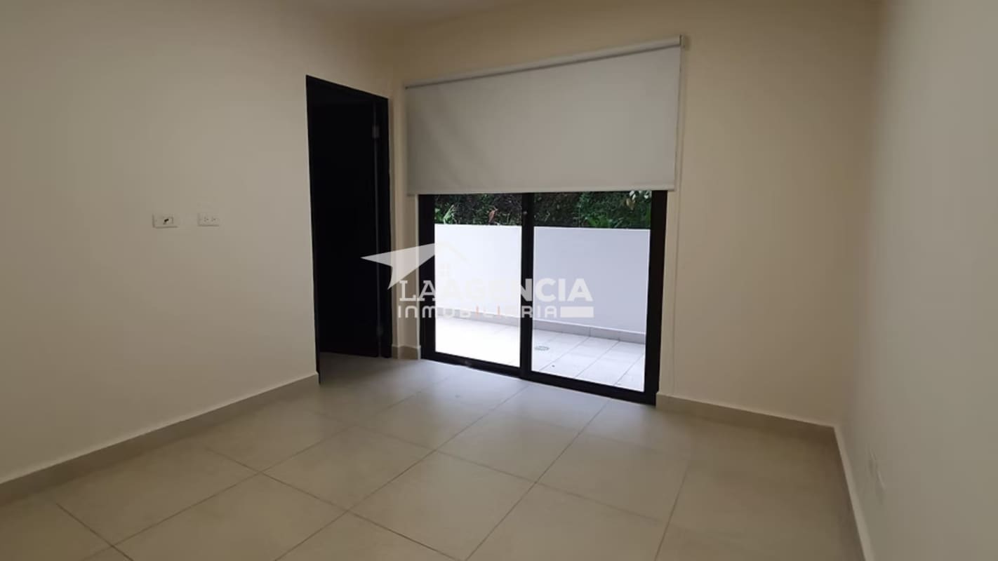 Modern hallway with tile flooring and AC in Embassy Village apartment