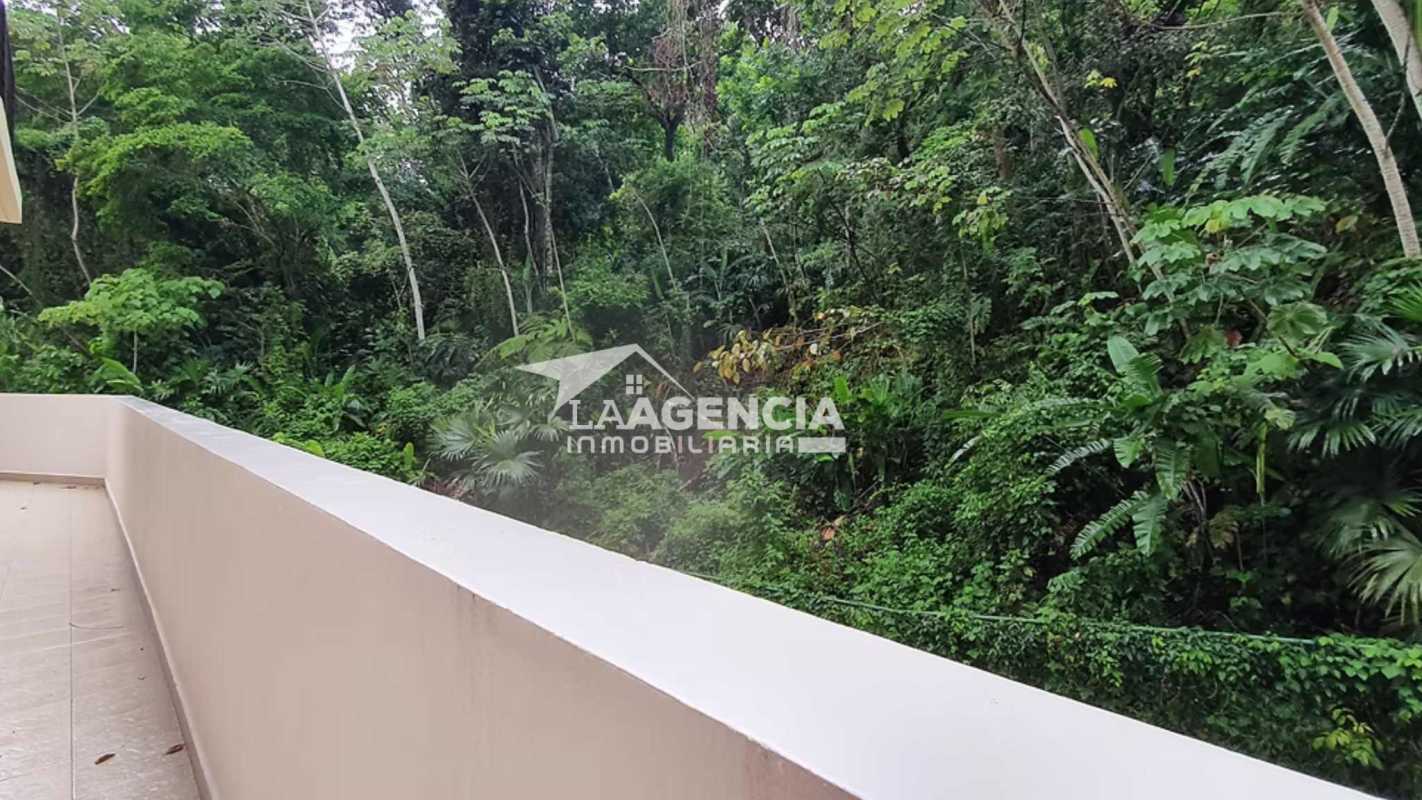 Balcony overlooking dense greenery from Embassy Village apartment Panama