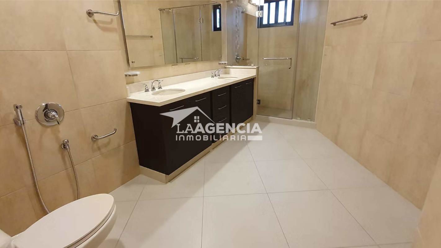 Large master bathroom with double sink vanity glass shower Embassy Village Panama