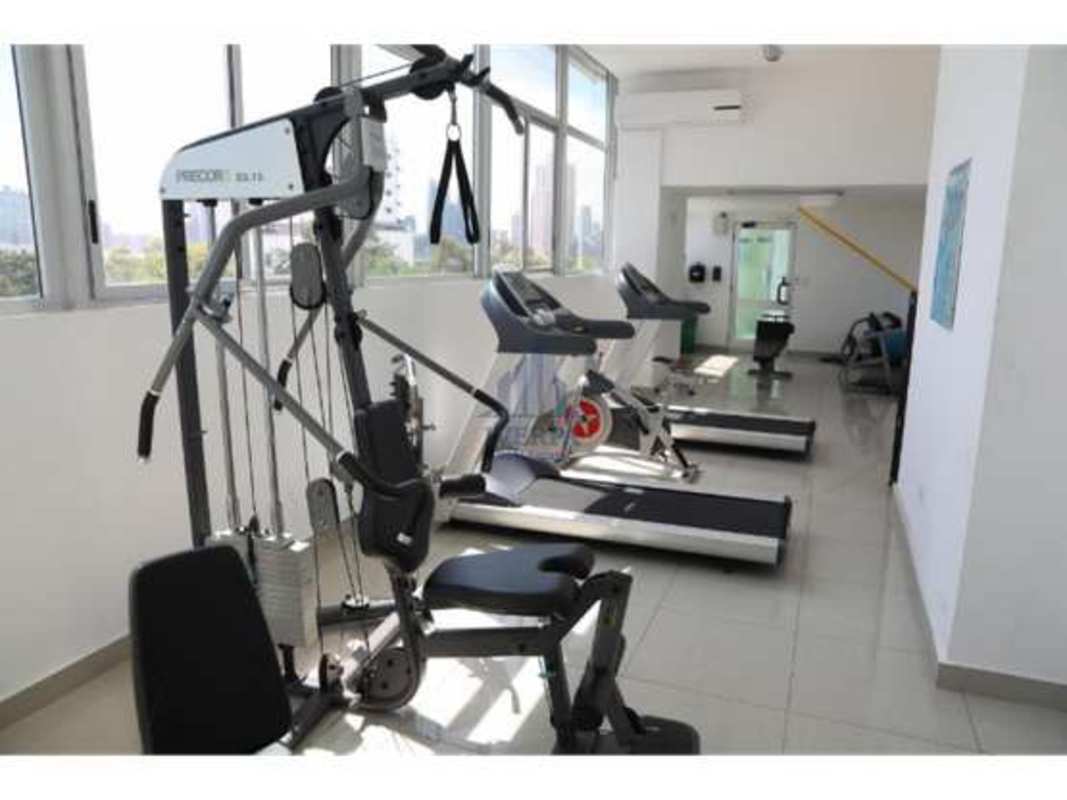 Modern dining room with panoramic windows, balcony access PH San Francisco Panama