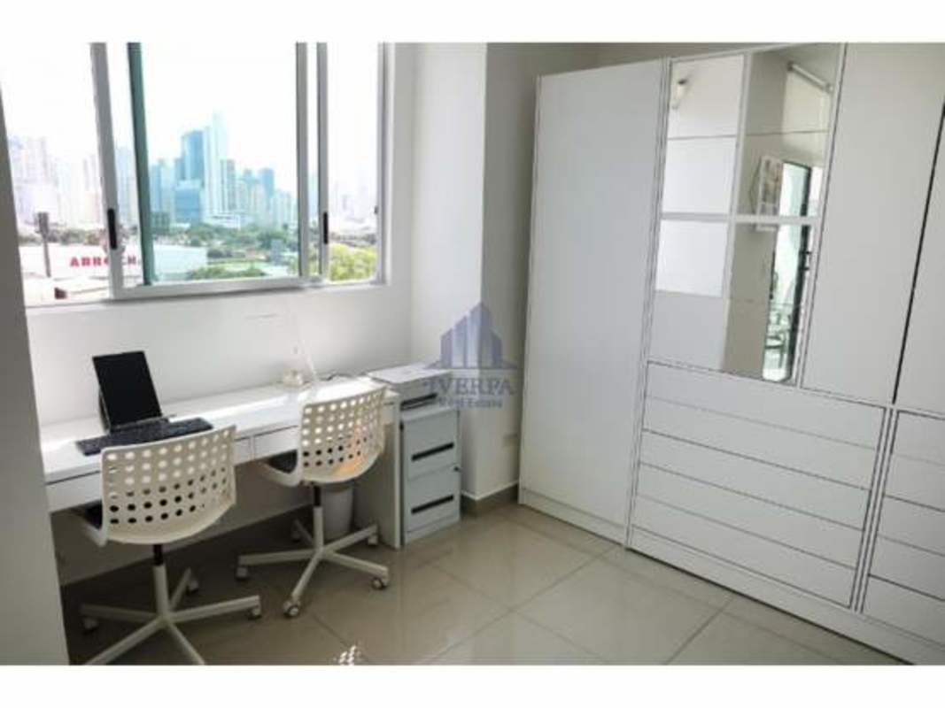 Minimalist bedroom with natural light built-in storage city view PH San Francisco Panama