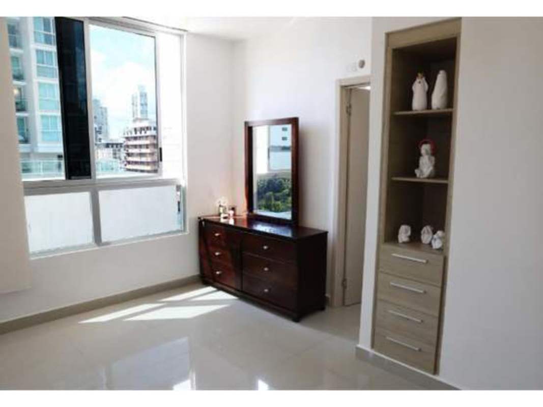 Kitchen featuring gas stove, appliances and stacked laundry in PH San Francisco Panama