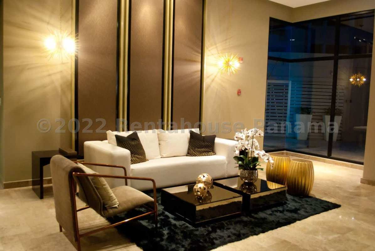 Spacious living room with balcony access and tiled floors PH Portofino Panama