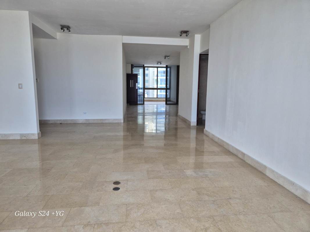 Spacious open living room with marble floors and floor-to-ceiling windows overlooking Pacific Ocean PH Panama Bay Panama