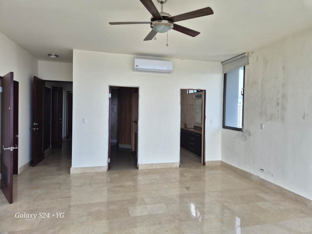 Open living-dining with marble floors ceiling fan window view PH Panama Bay Costa del Este