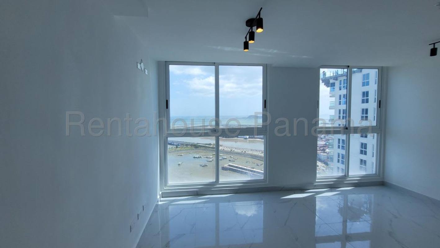 Bright modern living area with floor-to-ceiling sea views PH BICSA Avenida Balboa Panama