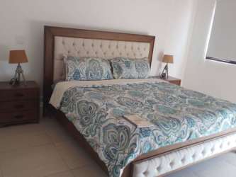 Stylish living area with ocean view balcony access in PH Royal Palm San Carlos Panama