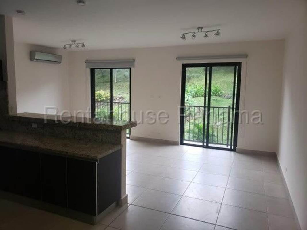 Bedroom with sliding glass door to balcony at Embassy Club Clayton Panama City