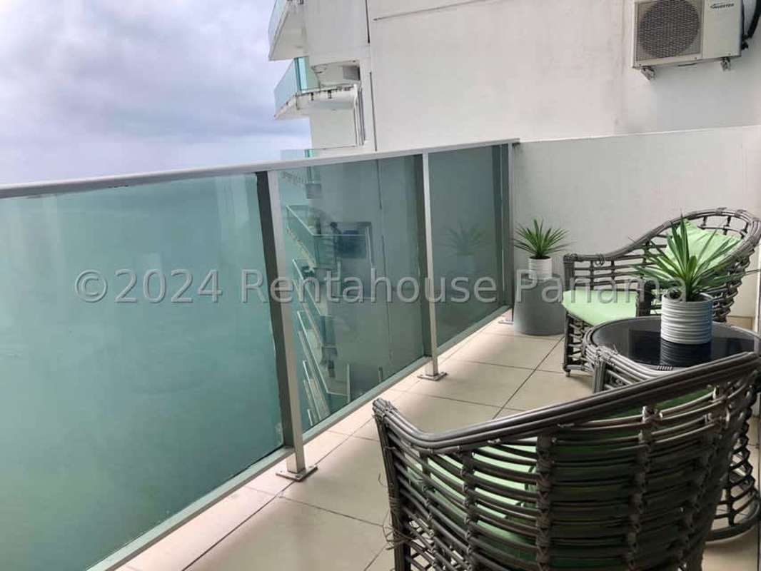 Bright living room with AC, balcony access and ocean views in PH Ocean Club Panama