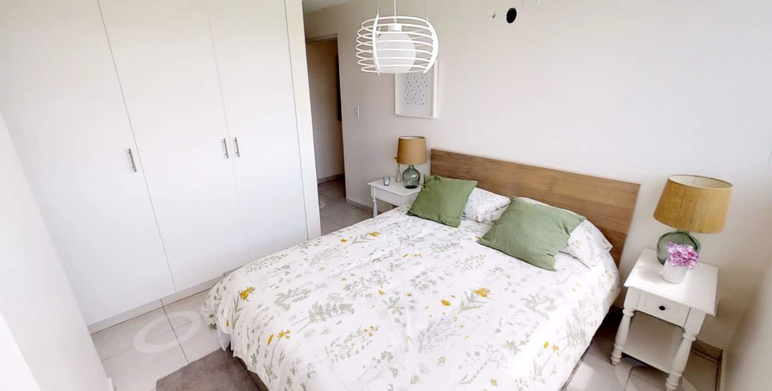 Modern minimalist bedroom with built-in wardrobe double bed and natural light PH Villa Crisol El Crisol Panama City