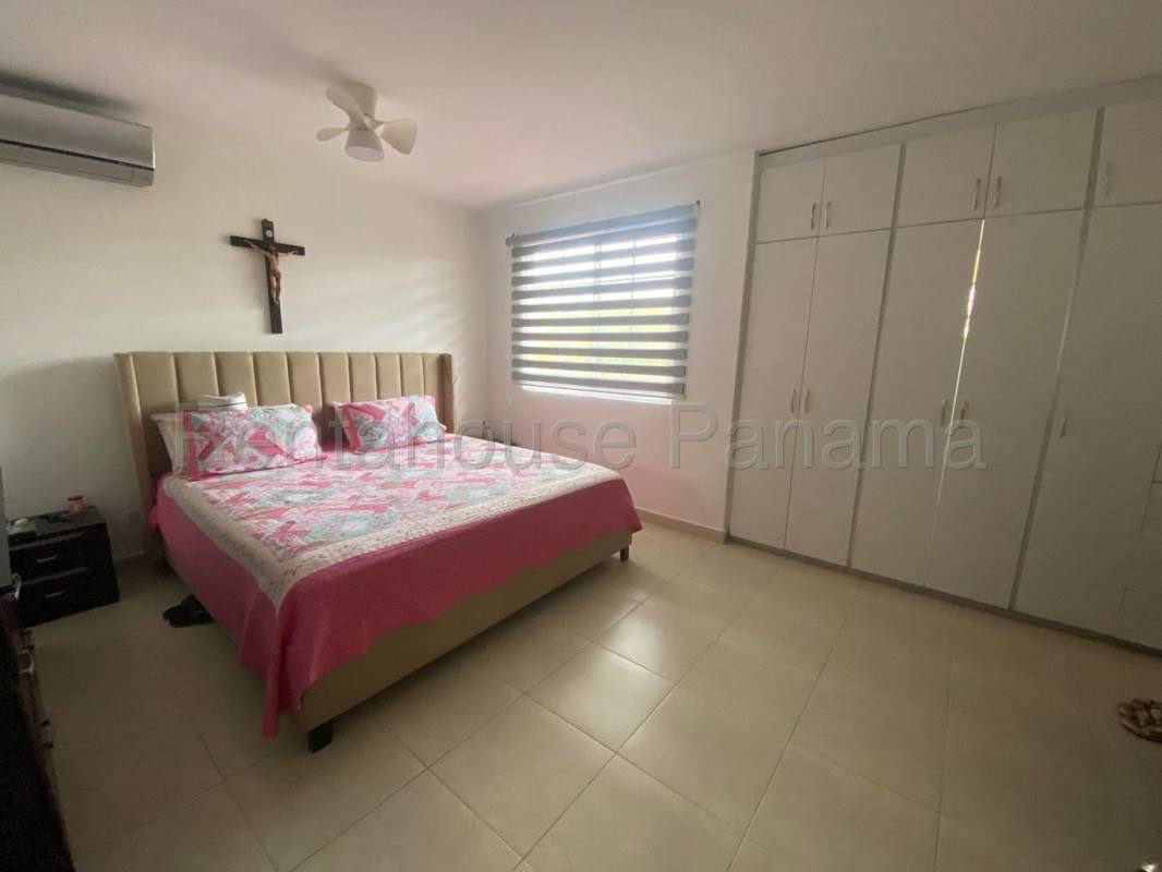 Spacious entry with staircase and tile floors inside Costa Sur villa Panama