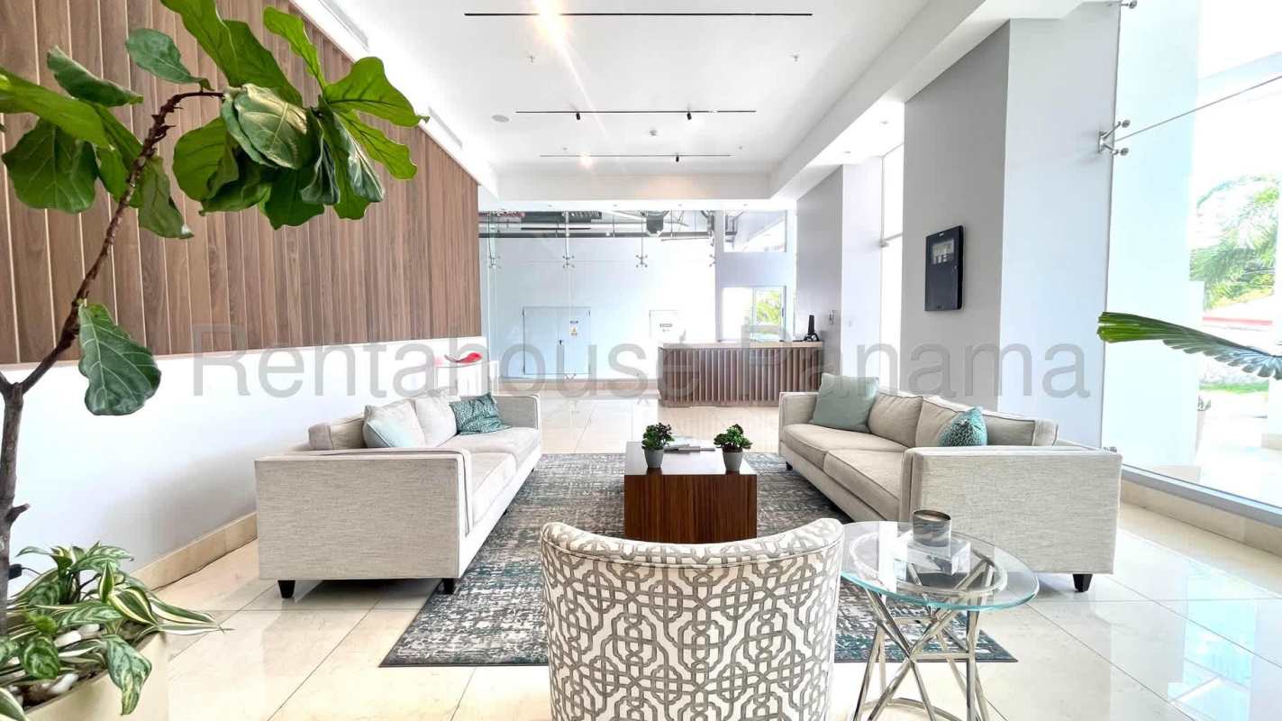 Contemporary open living-dining room with marble floor and balcony access PH Coco del Mar Panama