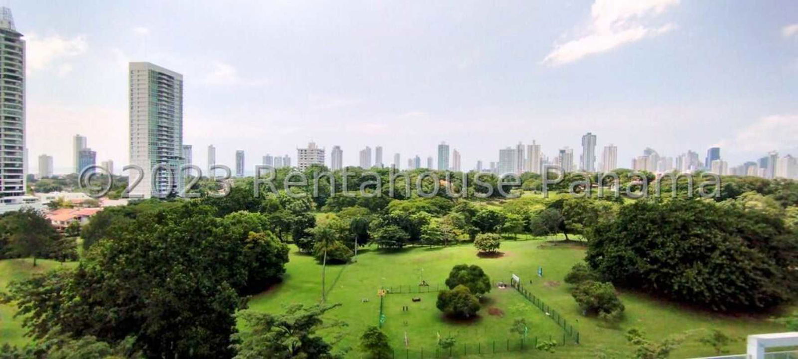 Outdoor children's playground with play structures at PH Carrasquilla Park Panama City