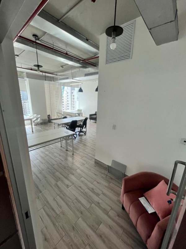 Industrial style office with pendant lighting and panoramic windows PH Office 77 Panama