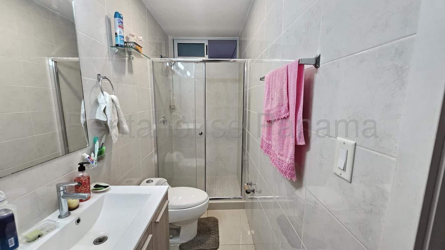 Modern bathroom with glass shower and vanity in Coral Plaza Towers Betania Panama