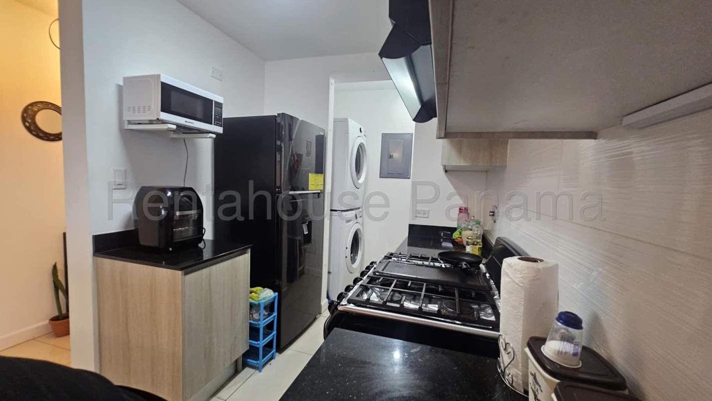 Bright open-plan living and dining space with tile floors in Coral Plaza Betania Panama