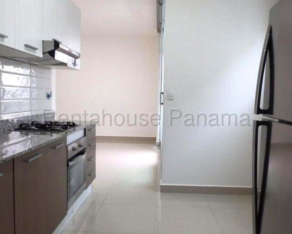 Bright bedroom with built-in closet and split AC unit PH Roma Tower San Francisco Panama