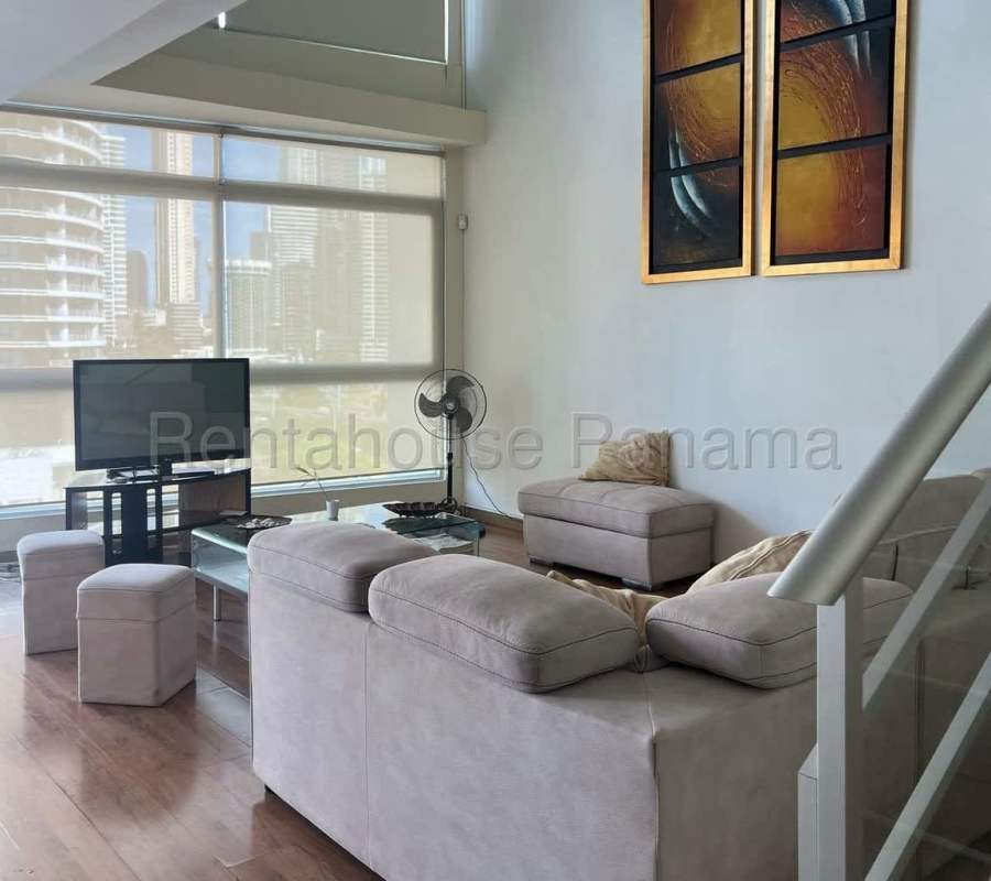 Open plan kitchen in furnished loft with granite counters at BICSA Tower Panama