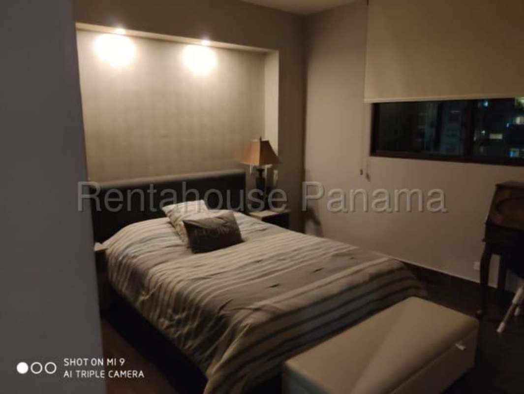 Bedroom with recessed lighting, large window, wood floor PH Costamare Costa Sur Panama