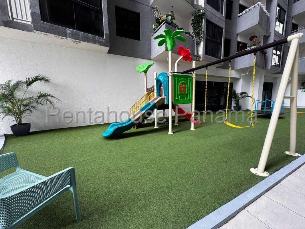 Panoramic rooftop pool area modern residential building city skyline PH Vía España