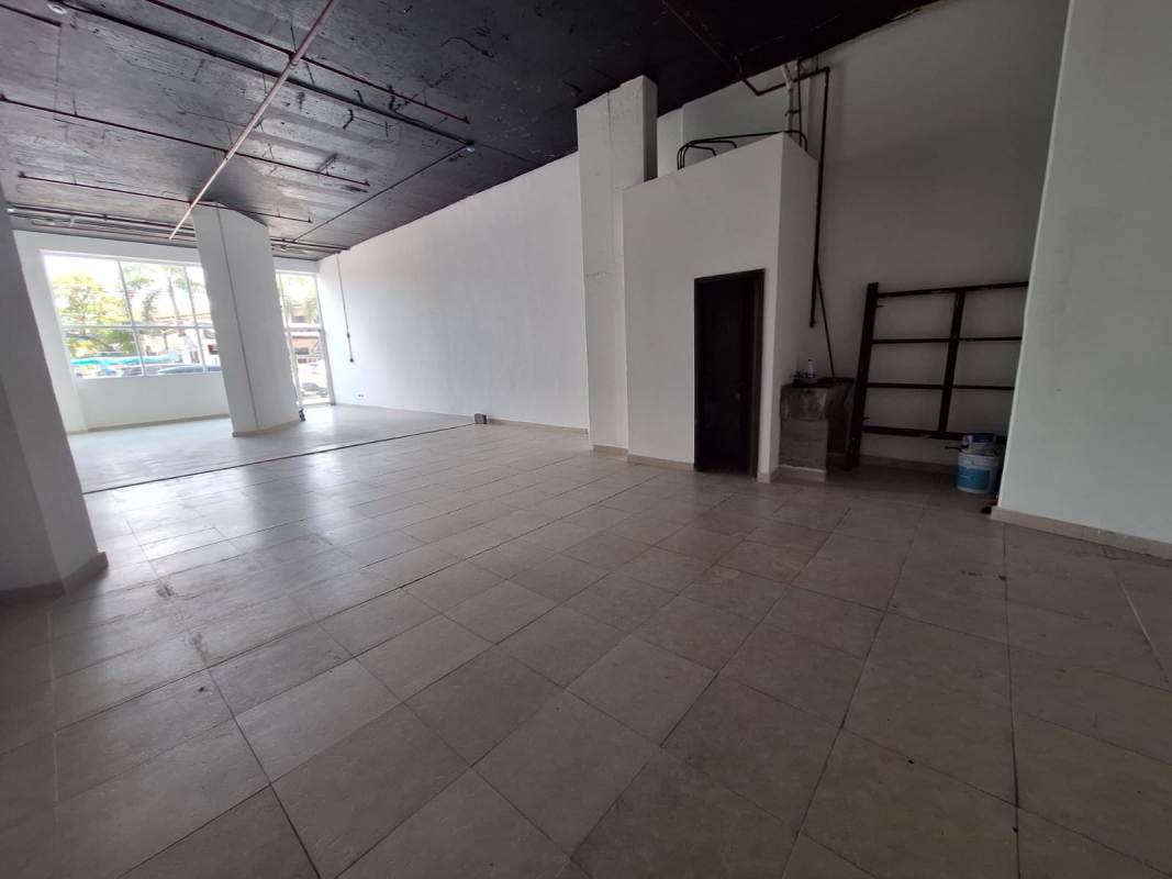 Commercial interior space with large glass window facing Avenida Balboa in PH Bay View