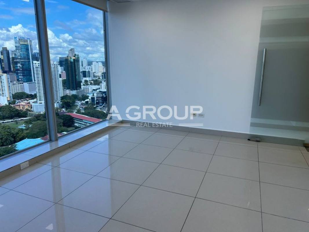 Small kitchenette with granite counter and cabinets in office building Oceania Torre 1000 Panama City