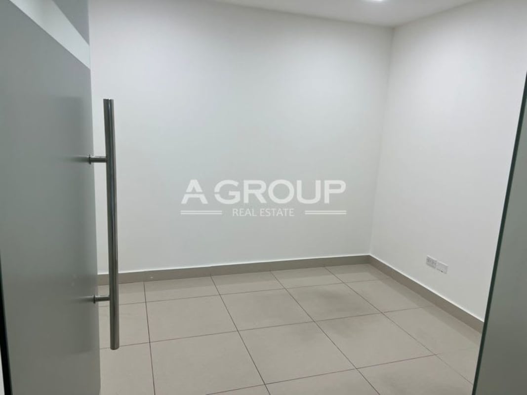 Modern enclosed private office space with glass doors in Oceania Punta Pacifica Panama