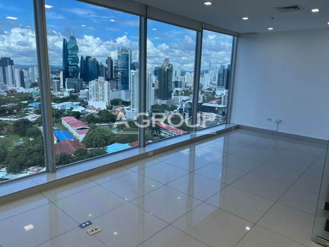 Empty modern private office room with glass panel door and tiled floor at Oceania Tower 1000 Panama