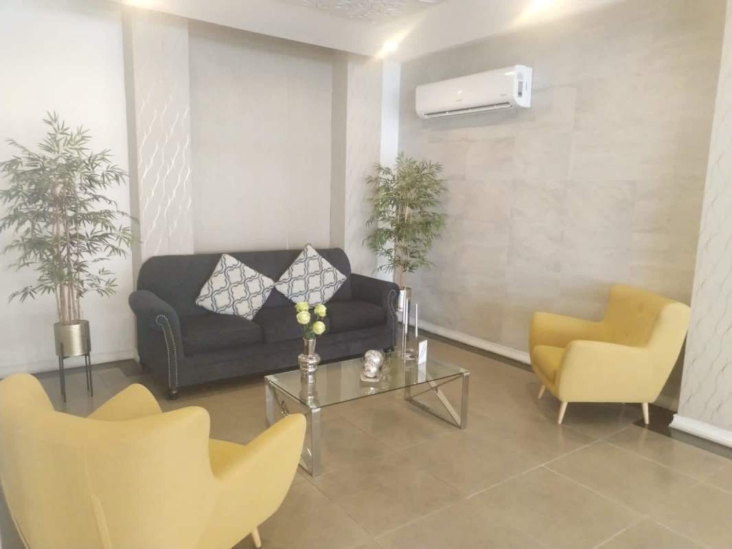 Stylish living room with tile floors and AC at PH Marquis Tower El Cangrejo, Panama City