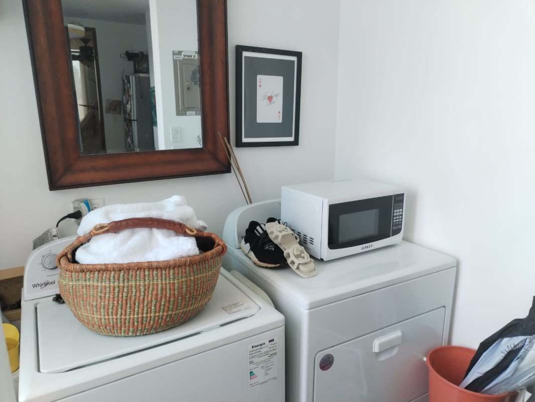 Laundry with new washer dryer and cabinets PH Marquis Tower El Cangrejo Panama City