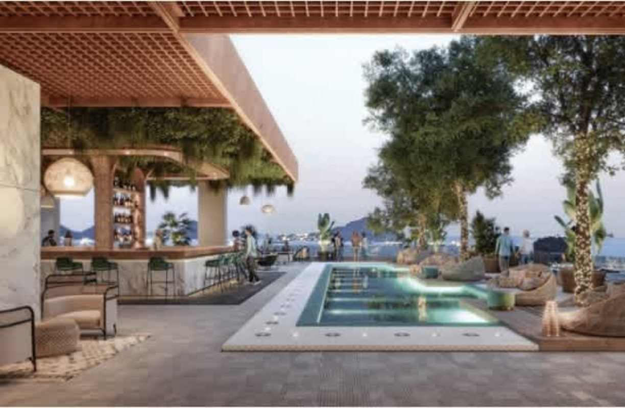 Rooftop lounge and outdoor pool with ocean views at Casa Bonita Residences Playa Bonita Panama