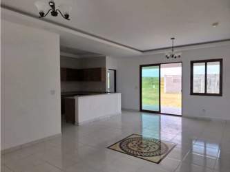 Granite countertop kitchen with natural light in Hacienda Pacifica home Panama