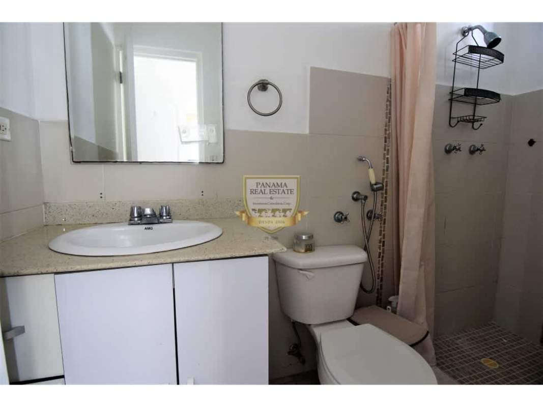 Bathroom with granite countertop vanity, mirror and walk-in shower PH Los Toneles Panama
