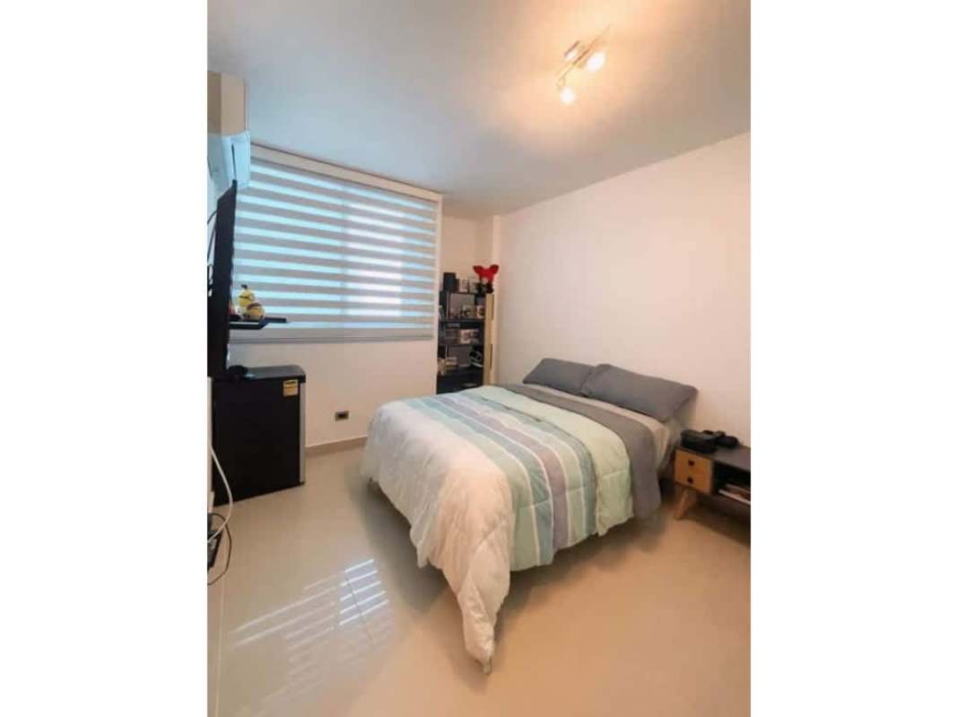 Spacious bedroom with panoramic city views in PH Waterfalls San Francisco Panama