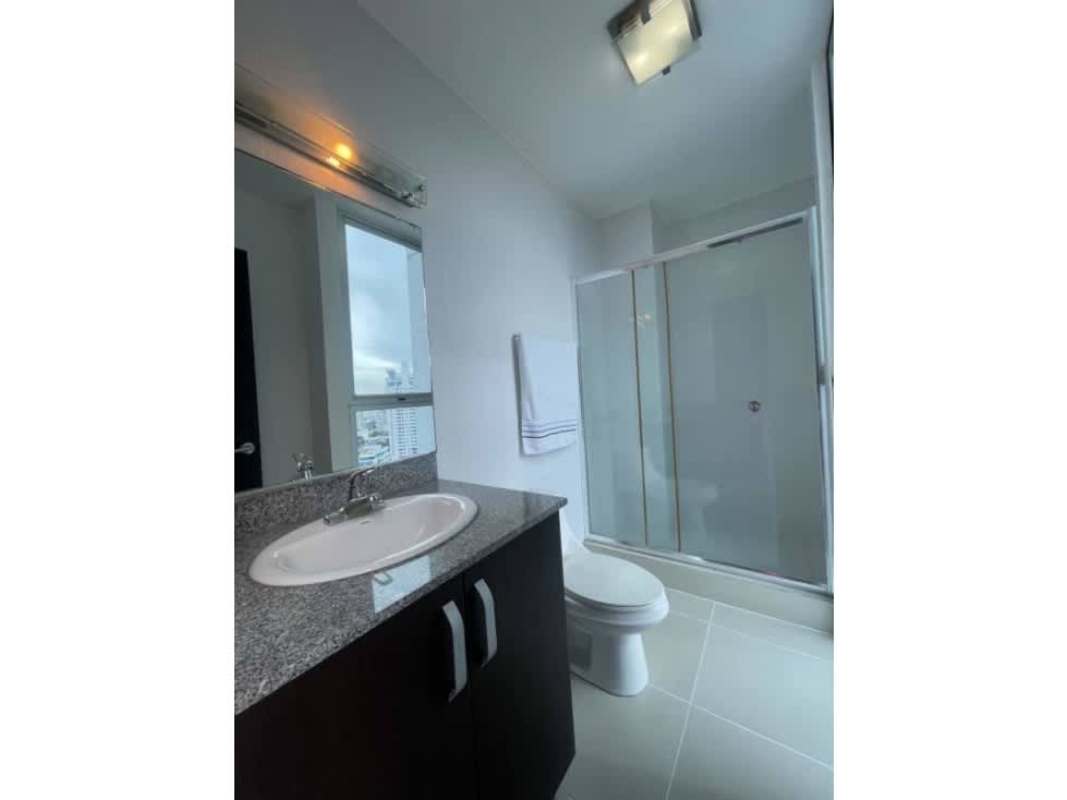 Modern bathroom with glass enclosed shower, granite vanity in PH Waterfalls Panama City