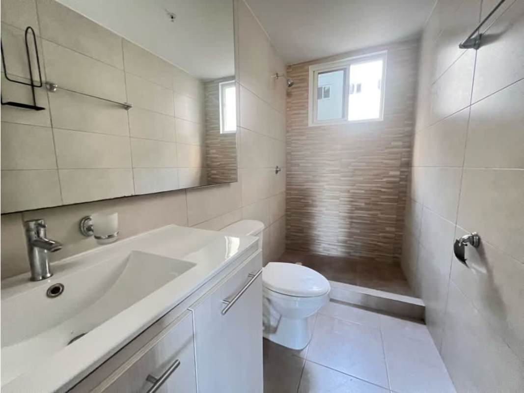 Modern bathroom beige tile walk-in shower vanity mirror PH Torres de Cantabria Panama