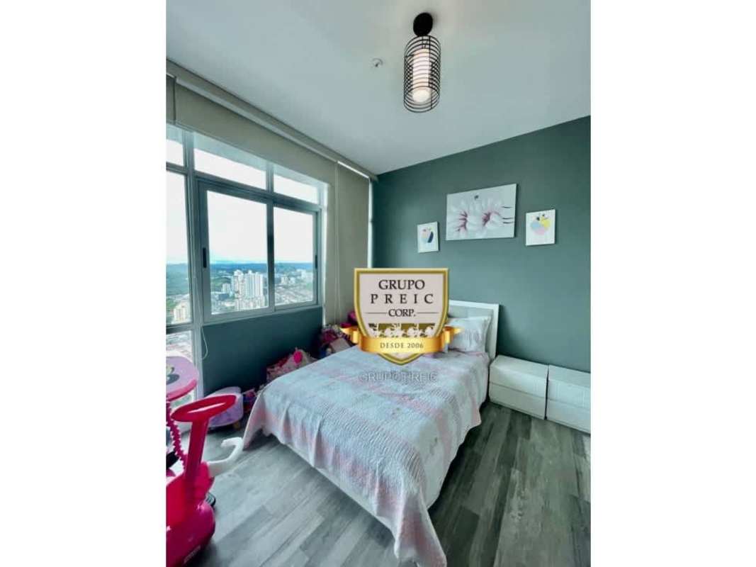Modern bedroom with large windows, city view, builtin closets at PH Elite 500 Panama City