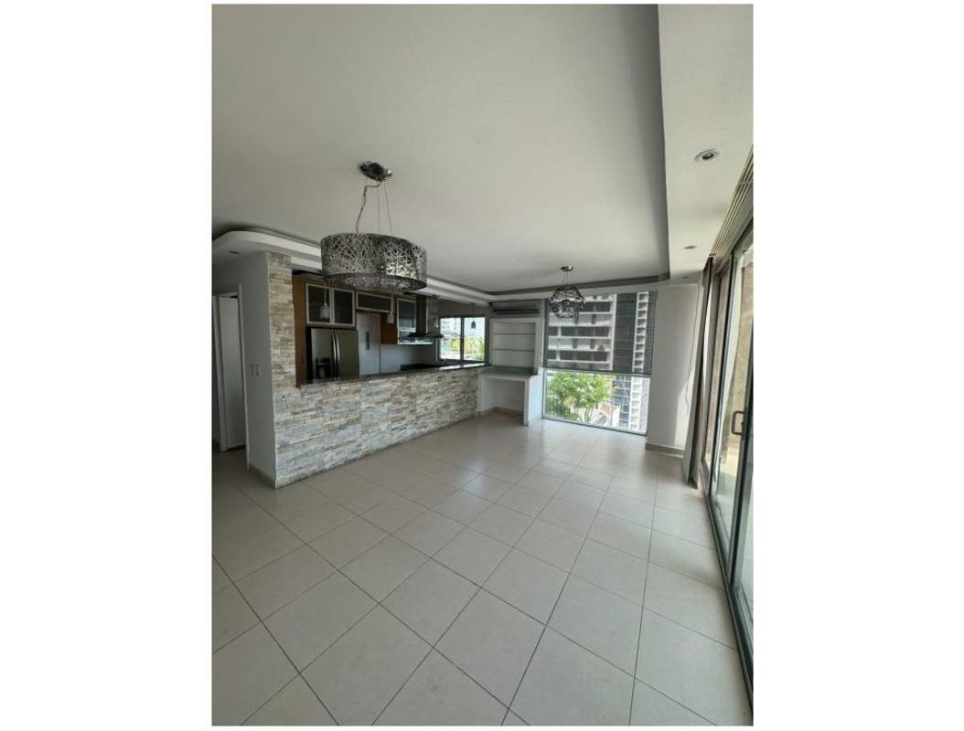 Master bedroom with tile floor, built-in closet, panoramic city view in Tao Tower Panama