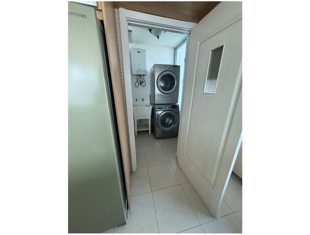 Modern bathroom glass shower enclosure granite veneer Tao Tower Panama