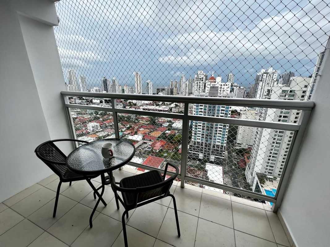 Apartment balcony with city skyline view and safety net PH Club de Golf Panama City