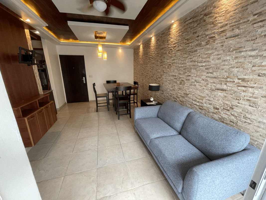 Laundry area with washer, dryer and gas water heater inside apartment in PH El Doral Panama