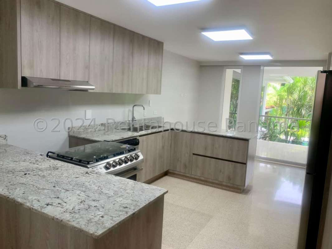 Granite countertop kitchen in luxury house with natural light Altos del Golf Panama