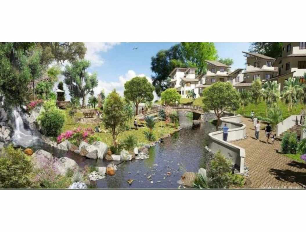 Beautiful landscaped gardens with pond bridge walking paths in Albrook Residences Panama