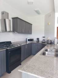 Fully equipped granite countertop kitchen PH Playa Blanca beachfront apartment Panama