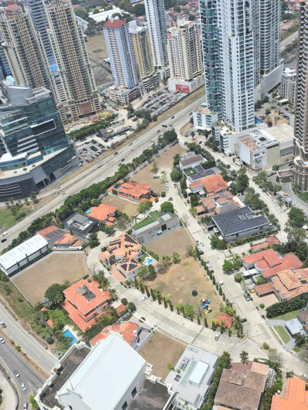 Aerial panorama of skyscrapers, residential homes, coastal area in Punta Pacífica with easy access to city and ocean Panama