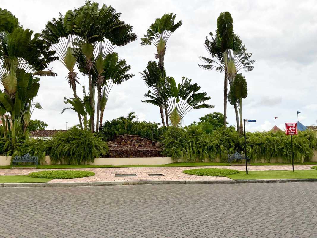 Formal dining room open-concept with elegant staircase in Costa Bay Costa del Este house Panama