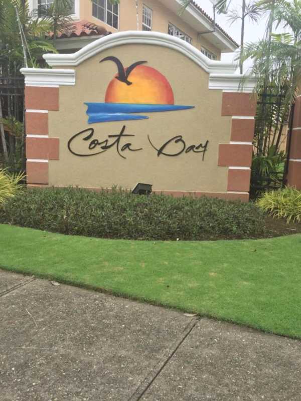 Bright living room with ceramic floors, large windows and garden views Costa Bay Costa del Este Panama