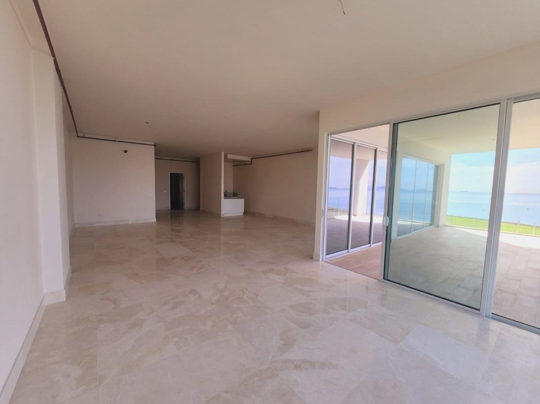 Expansive modern living room marble floors panoramic ocean skyline views Ocean Reef Islands Panama City