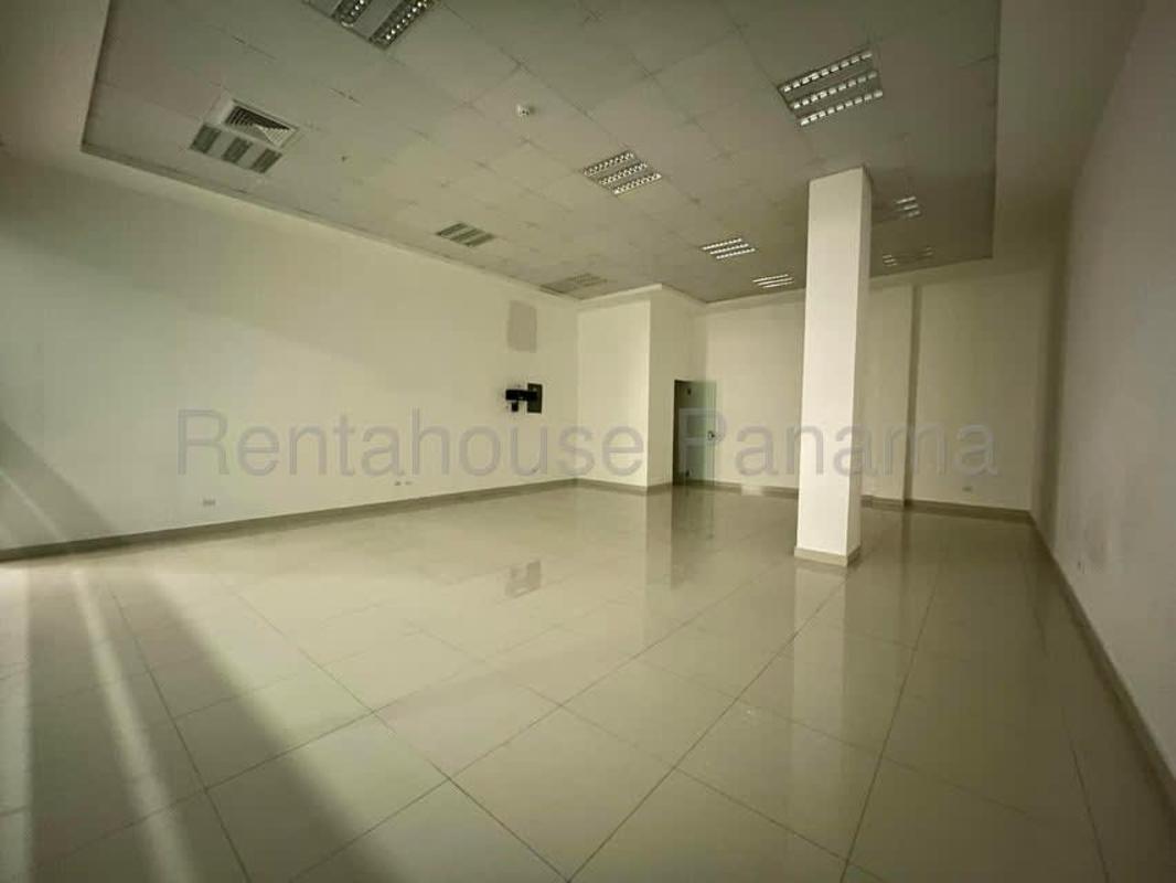 Empty office retail unit with tiled floor and glass entrance in RALI Business Center Panama