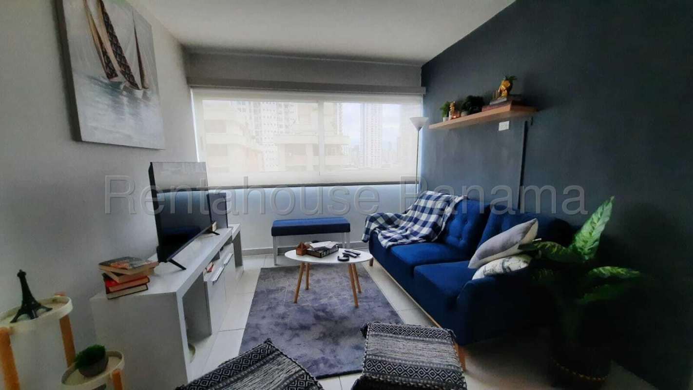 Bright living area with balcony access and skyline views in PH Altos del Golf Panama City